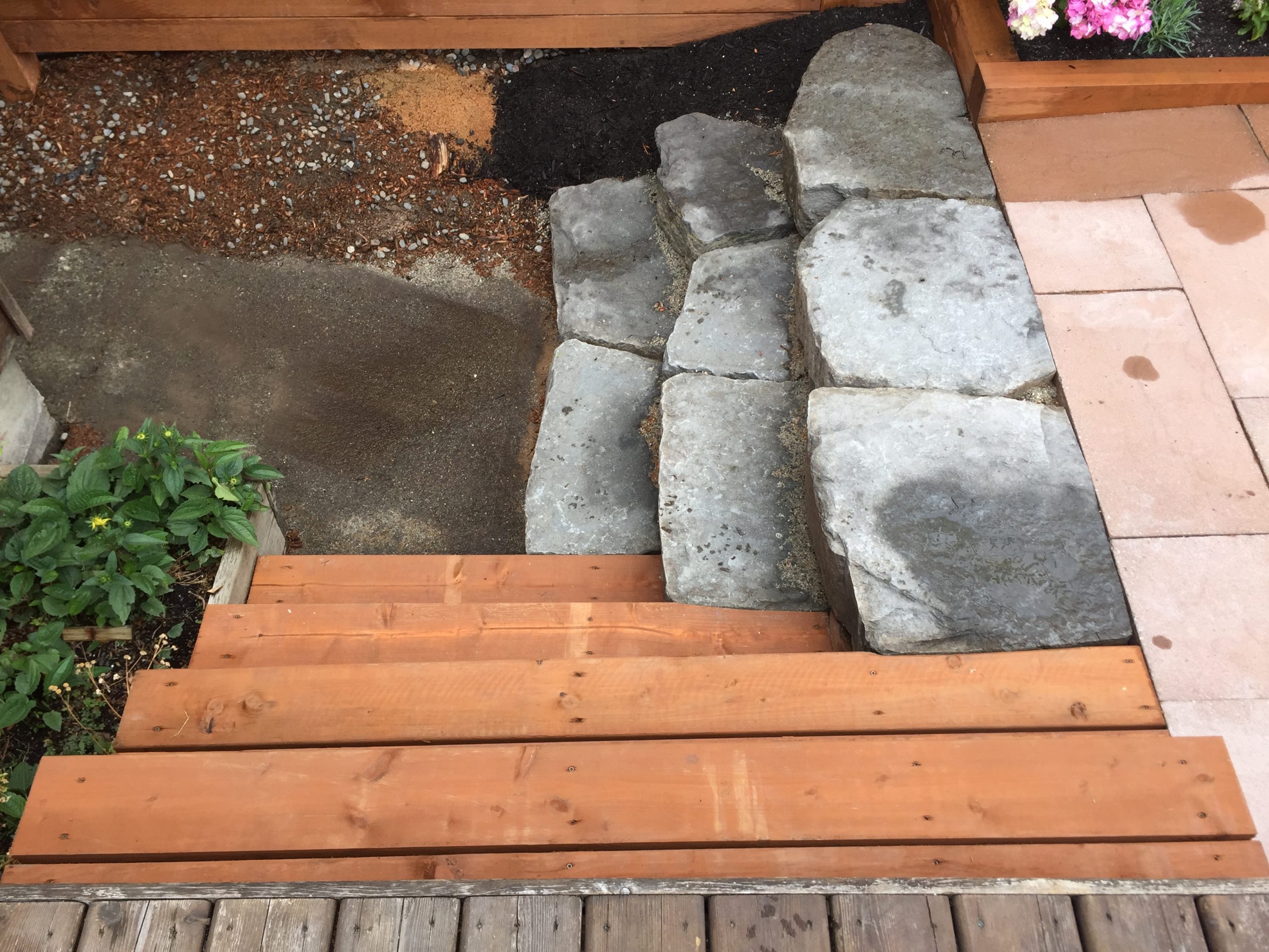 Basalt stone stairs and wood deck stairs landscape construction vancouver bc